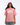 Person wearing a pink 'SKZ' t-shirt and cap on a white background