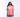Person wearing a pink 'SKZ' t-shirt and cap on a white background