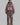 pink and brow jump suit on a lady